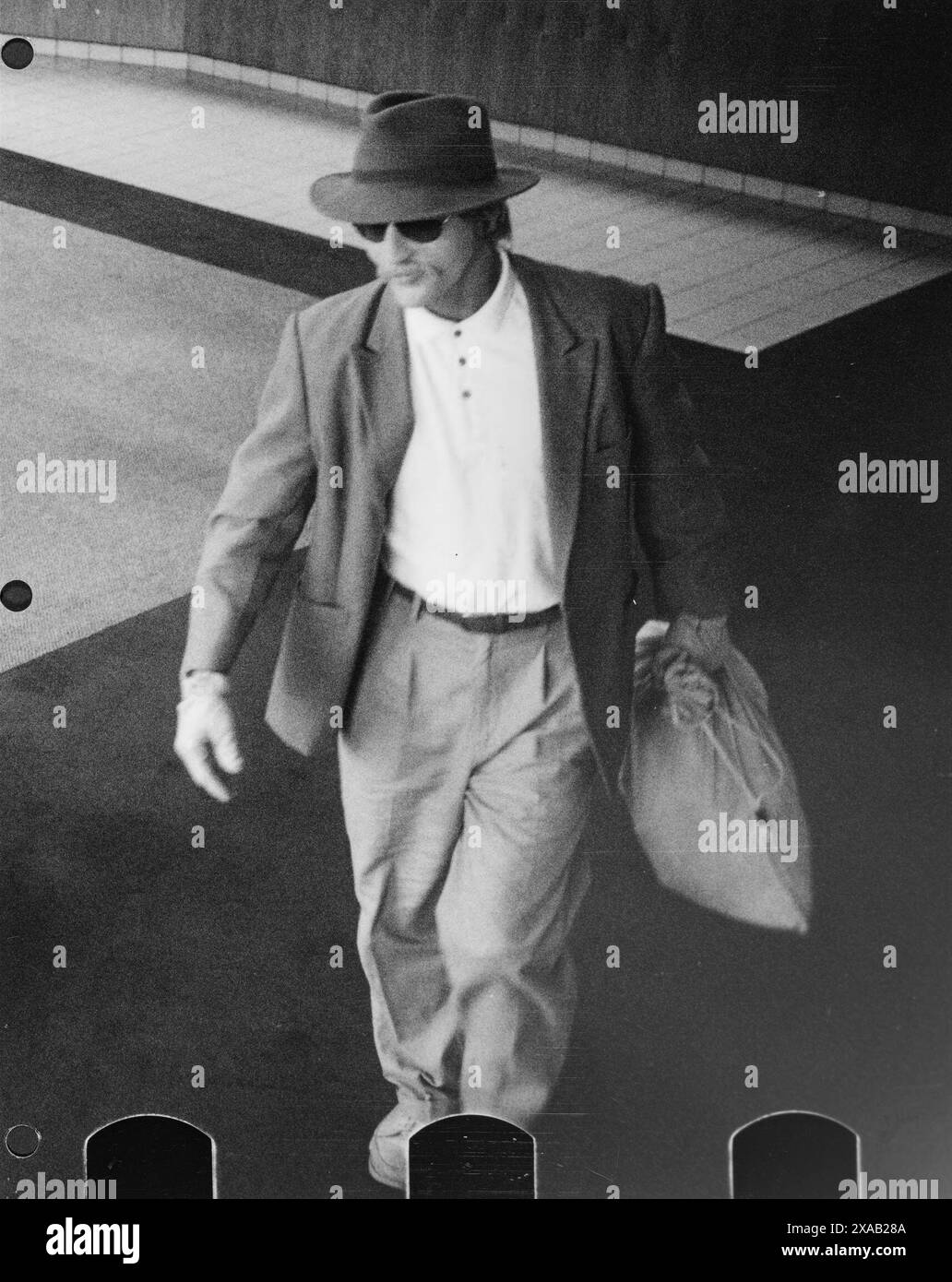 DATE DE SORTIE : 5 juin 2024 : TITRE : Comment Rob une banque. STUDIO : Netflix. RÉALISATEUR : Stephen Robert Morse, Seth Porges. INTRIGUE : dans ce documentaire sur le crime vrai, un rebelle charismatique dans les années 1990 Seattle sort une série sans précédent de vols de banque tout droit sortis des films. EN VEDETTE : SCOTT SCURLOCK. (Crédit image : © Netflix/Entertainment Pictures/ZUMAPRESS.com) USAGE ÉDITORIAL SEULEMENT ! Non destiné à UN USAGE commercial ! Banque D'Images