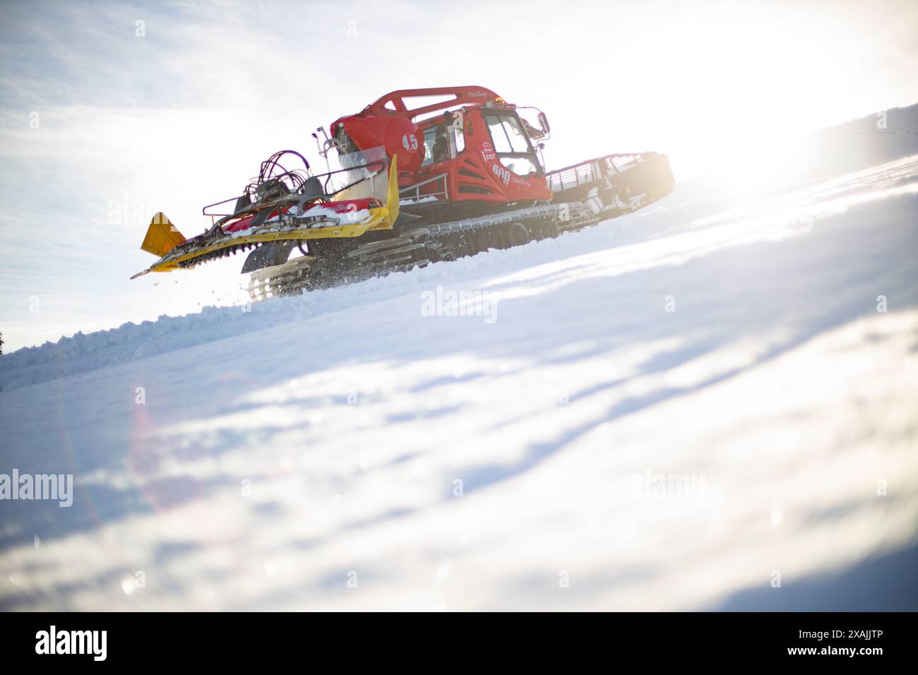 Toiletteur de neige préparant des pistes à Kitzbühel, Autriche Banque D'Images