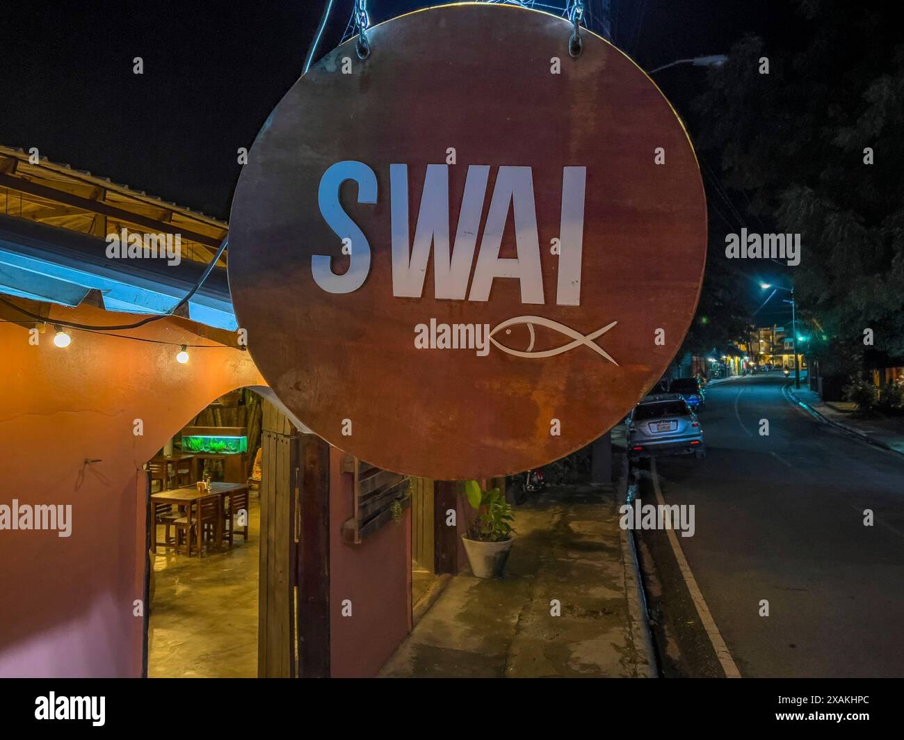 Amérique du Nord, Caraïbes, Grande Antilles, Île d'Hispaniola, République dominicaine, côte nord, Cabarete, scène de rue devant le restaurant Swai à Cabarete Banque D'Images