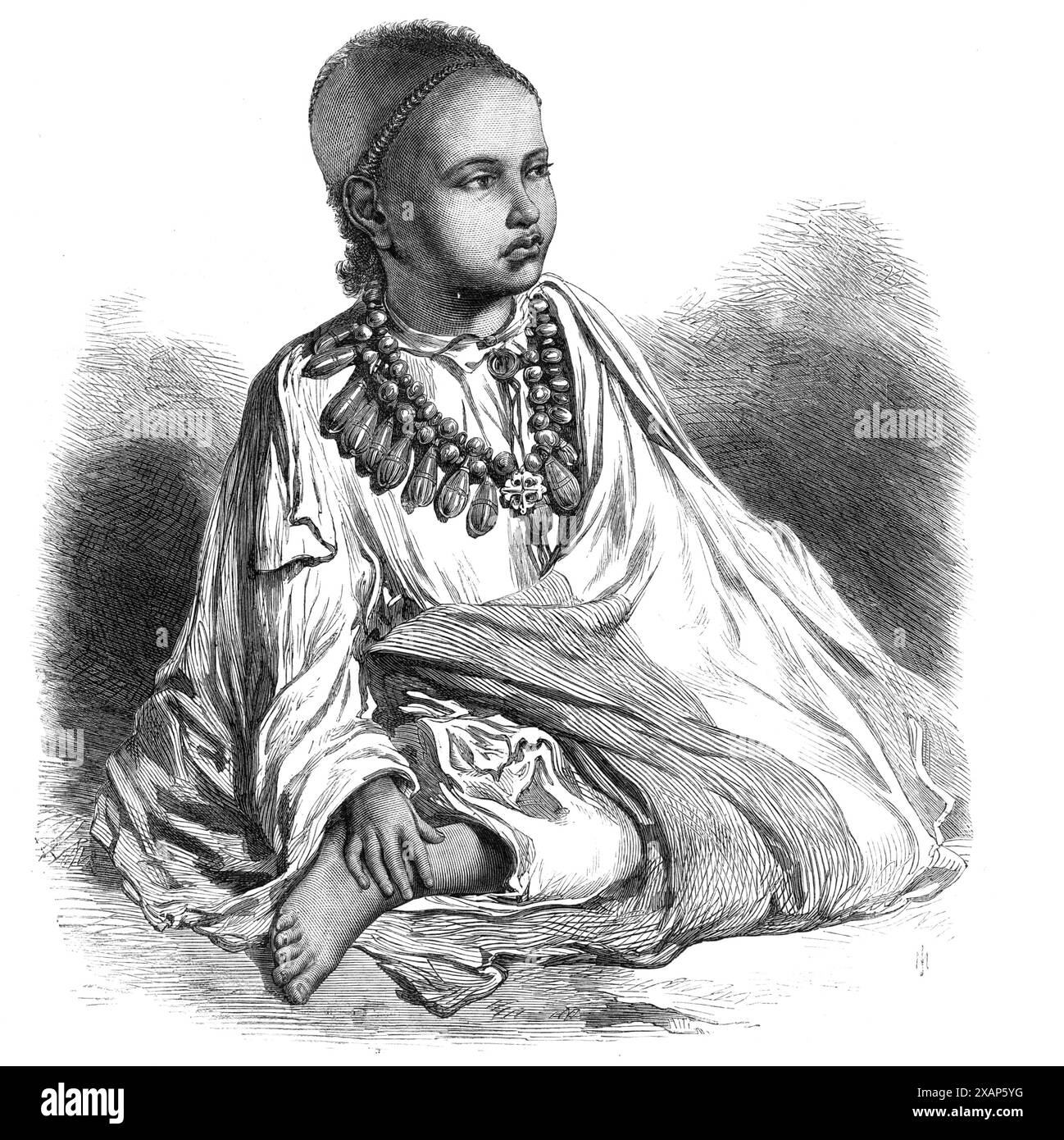 Dejatch Alamaeo, fils de Théodore, défunt roi d'Abyssinie, 1868. Le infant...now à la fois sans père et sans mère,... est nommé Alamaeo ou Allumahyu (comme il est parfois écrit), ce qui signifie dans la langue amharique "j'ai vu le monde." Mais ce pauvre petit orphelin, qui n'a que sept ans, né en juin 1861, en a vu très peu. Il en verra cependant beaucoup plus que son père ne l'a jamais fait, puisqu'il sera éduqué par le Dr Wilson au Mission College de Bombay. Il porte le titre de Dejatch, qui est Prince ou Duc ; son étymologie se réfère à la baguette Banque D'Images