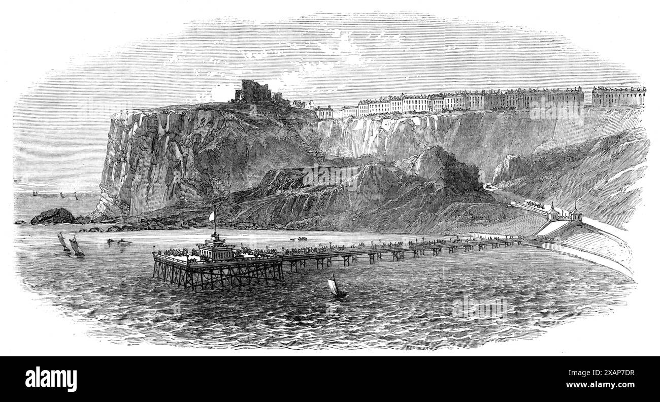 Le nouveau quai de Scarborough, 1869. 'La jetée est construite en fer...[et] est d'environ 1000 pieds. En longueur... la superstructure repose sur treize amas de pieux, dans des portées de 66 pieds. Et soixante-deux pieux en fer forgé dans la tête de la jetée, formés de rails de Barlow... le système de poutres continues est adopté, qui s'est avéré répondre si bien en cas d'accident à l'un des groupes de colonnes. Le pont de la jetée est... de planches proches. Le long du corps principal, il y a douze évidements... et le logement du siège sur toute la longueur. A la tête un salon commode a été érigé ; et costume Banque D'Images