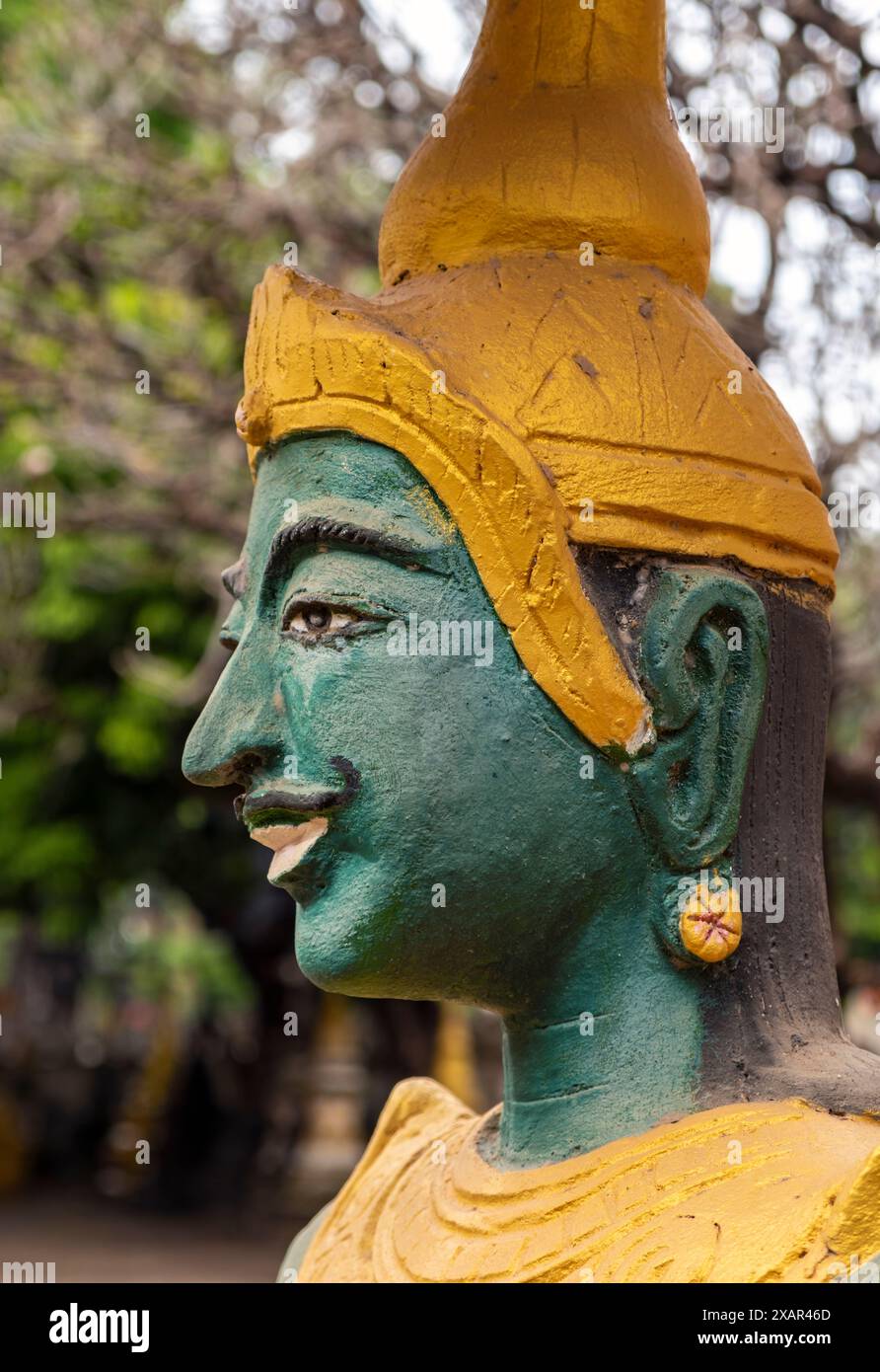 Statue de gardien à face verte, temple Wat Kao Nhot, Vientiane, Laos Banque D'Images