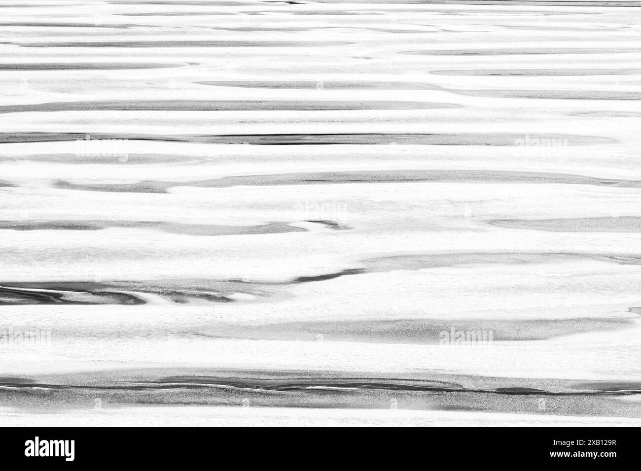 Groenland. Gros plan graphique de la fonte printanière de glace rapide. Banque D'Images
