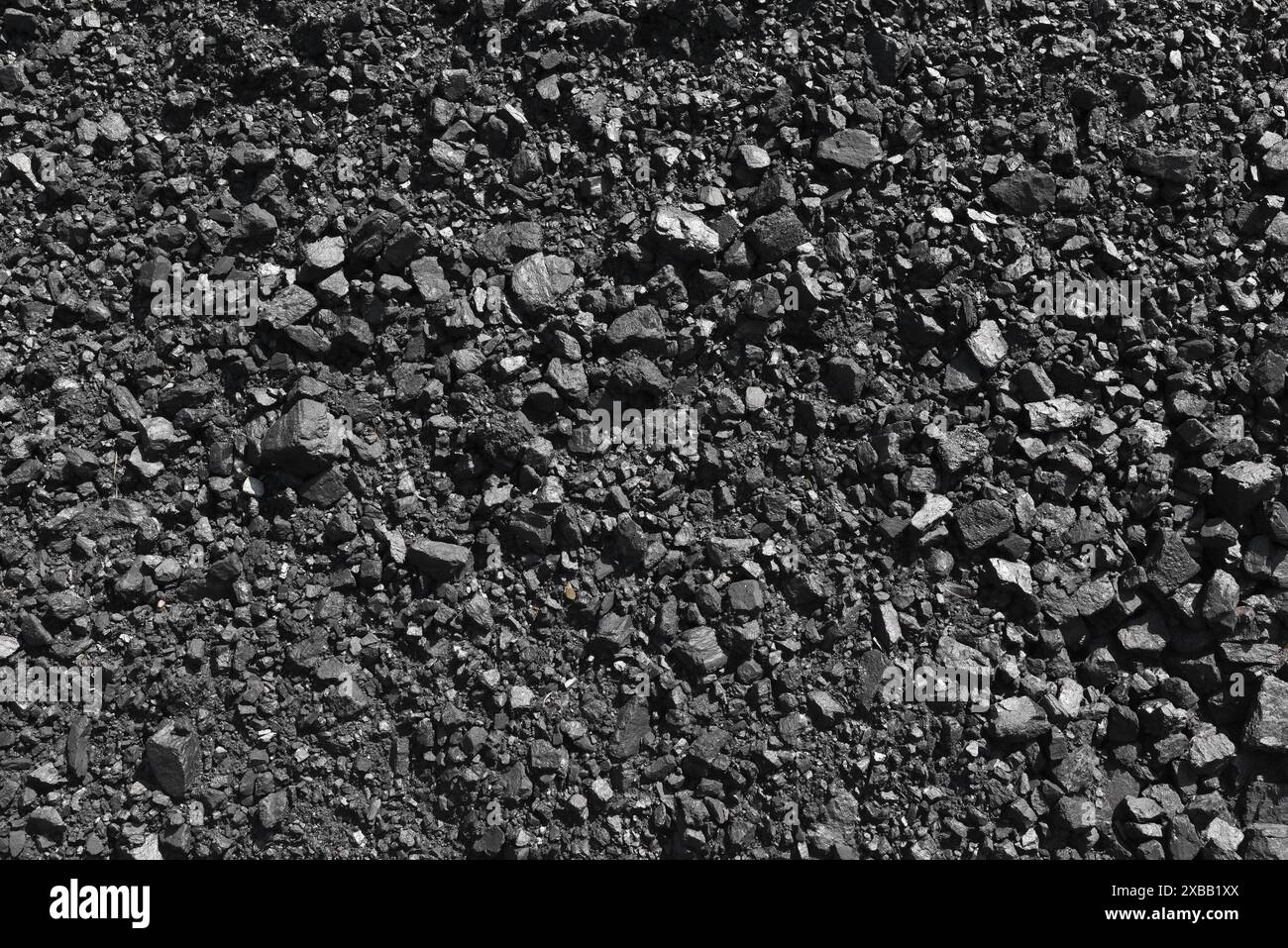 Charbons noirs naturels pour le fond. Charbon industriel. Production de minéraux utiles Banque D'Images