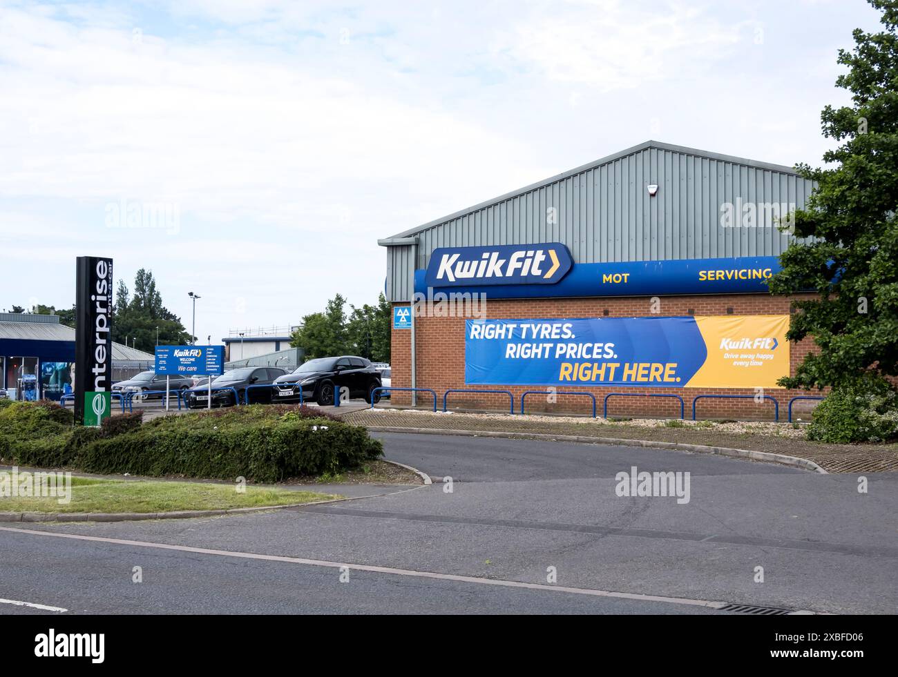 Kwik FIT mot and Servicing garage, Outer Circle Road, Lincoln City, Lincolnshire, Angleterre, ROYAUME-UNI Banque D'Images