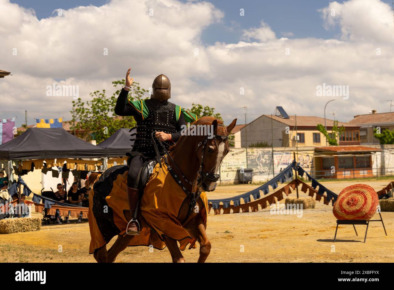 homme montant un cheval en joute Banque D'Images