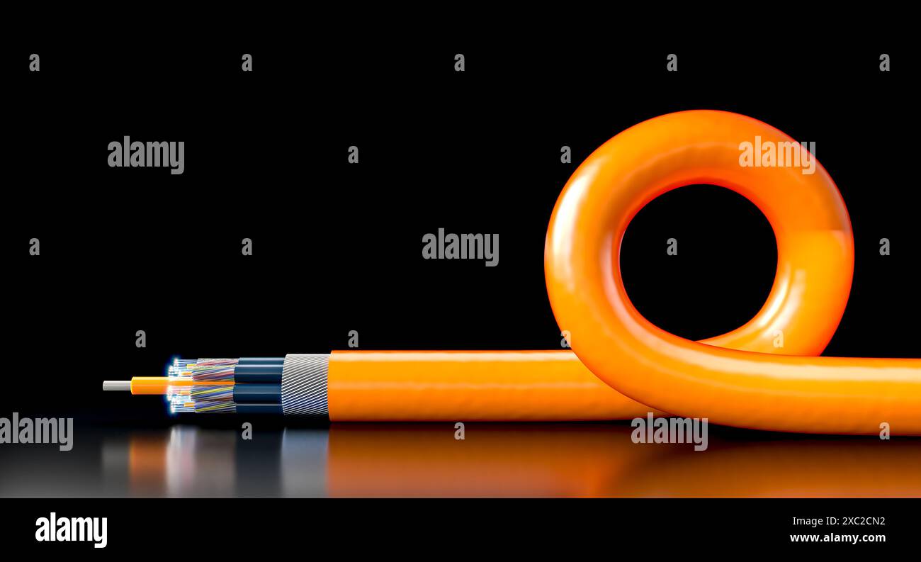 Câble à fibre optique orange reposant sur une surface réfléchissante noire avec une boucle Banque D'Images