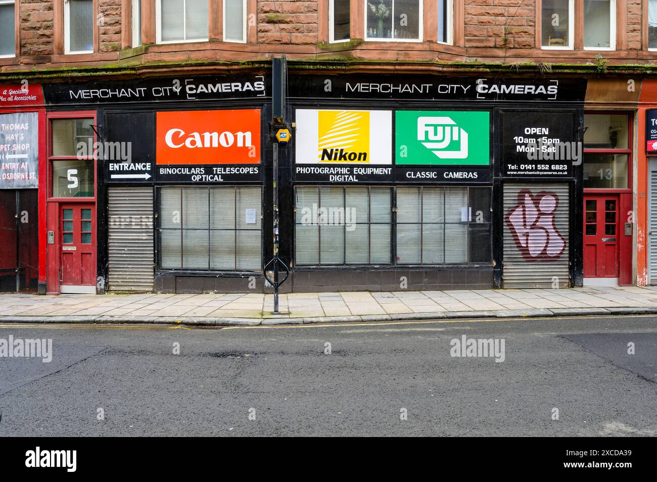 Cette boutique est définitivement fermée. L'ancien magasin Merchant City Cameras, Parnie Street, Glasgow, Écosse, Royaume-Uni, Europe Banque D'Images