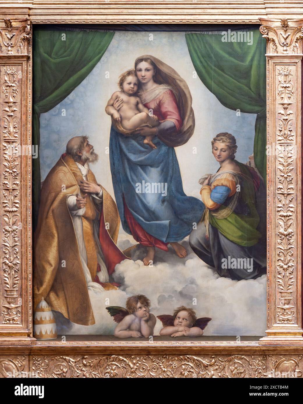 Peinture nommée la Vierge Sixtine, également appelée la Vierge di San Sisto, est une peinture à l'huile de l'artiste italien Raphaël exposée à Old Masters pic Banque D'Images