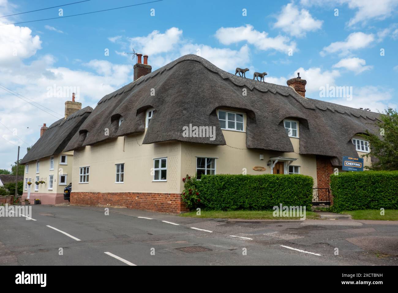 Un chalet classé Grade ll au toit de chaume à Church Green Hinxton Cambridgeshire Banque D'Images