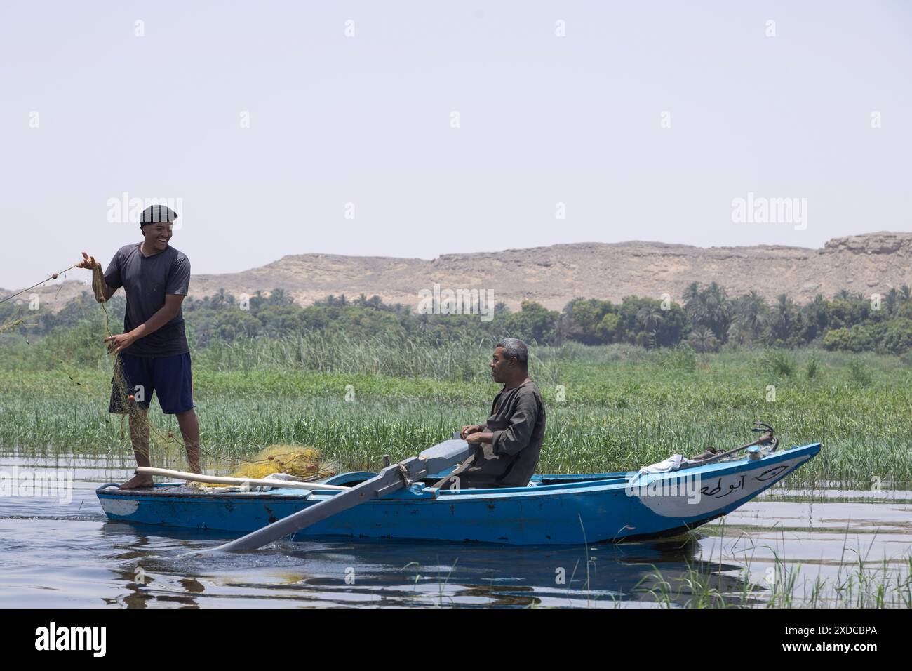 Pêcheurs du village de Bisaw sur une île du Nil à environ 90 km au nord d'Assouan. Banque D'Images