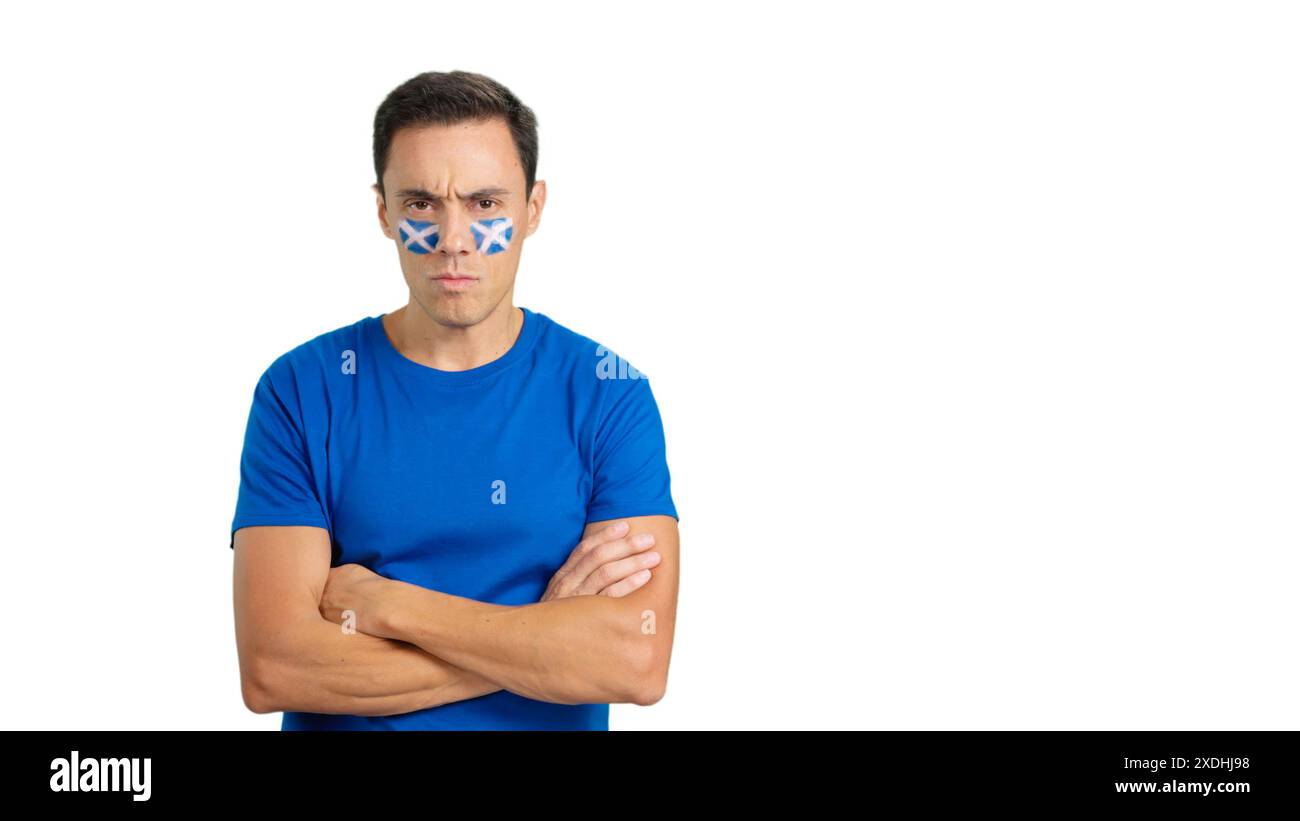 Homme digne et sérieux avec drapeau écossais peint sur le visage Banque D'Images