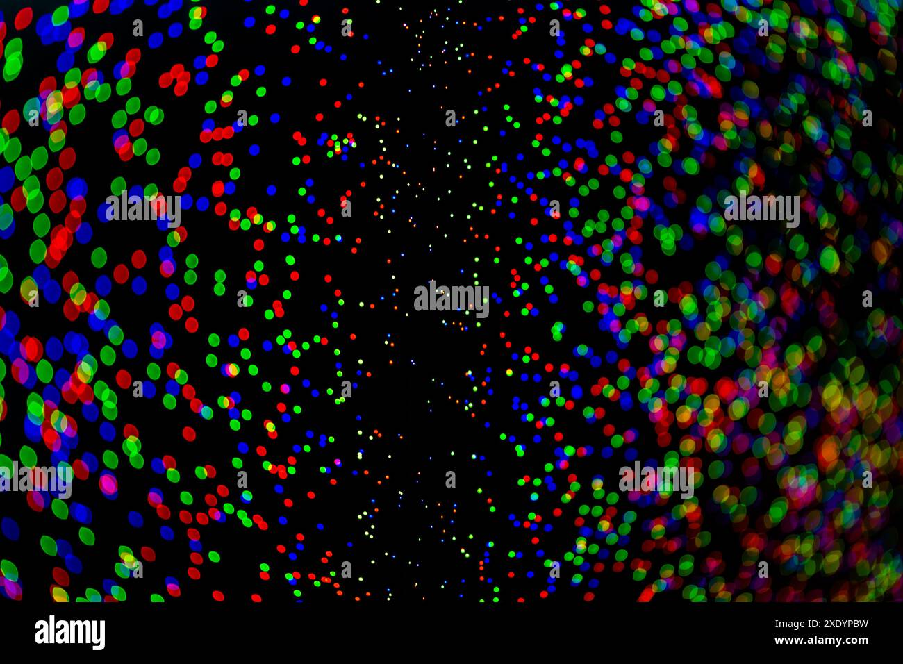 Flou naturel de la petite lentille rgb sur fond sombre Banque D'Images