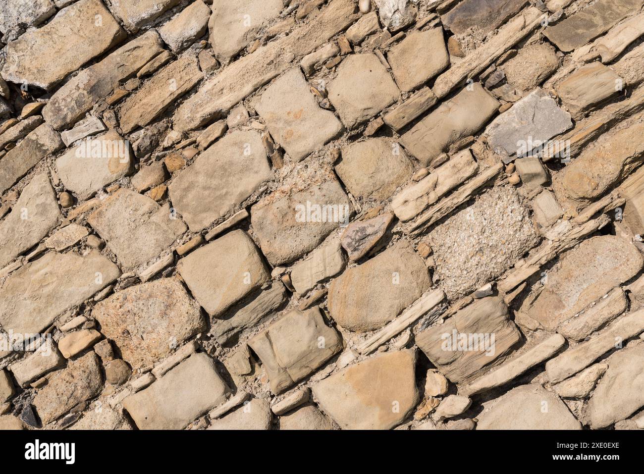 Mur de pierre avec de vieilles pierres naturelles - mur de pierre et fond Banque D'Images