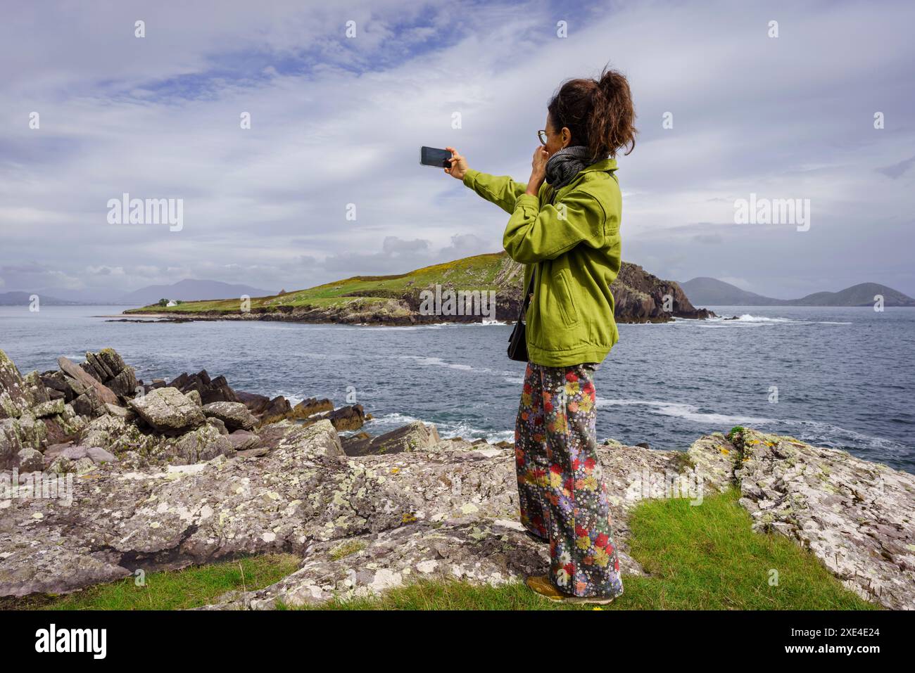 Femme photographiant Horse Island Banque D'Images