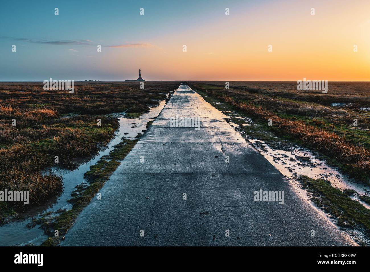 Phare de Westerheversand sur la mer du Nord un point de repère de la péninsule d'Eiderstedt en Allemagne. Banque D'Images Phare de Westerheversand sur la mer du Nord un point de repère de la péninsule d'Eiderstedt en Allemagne. Banque D'Images