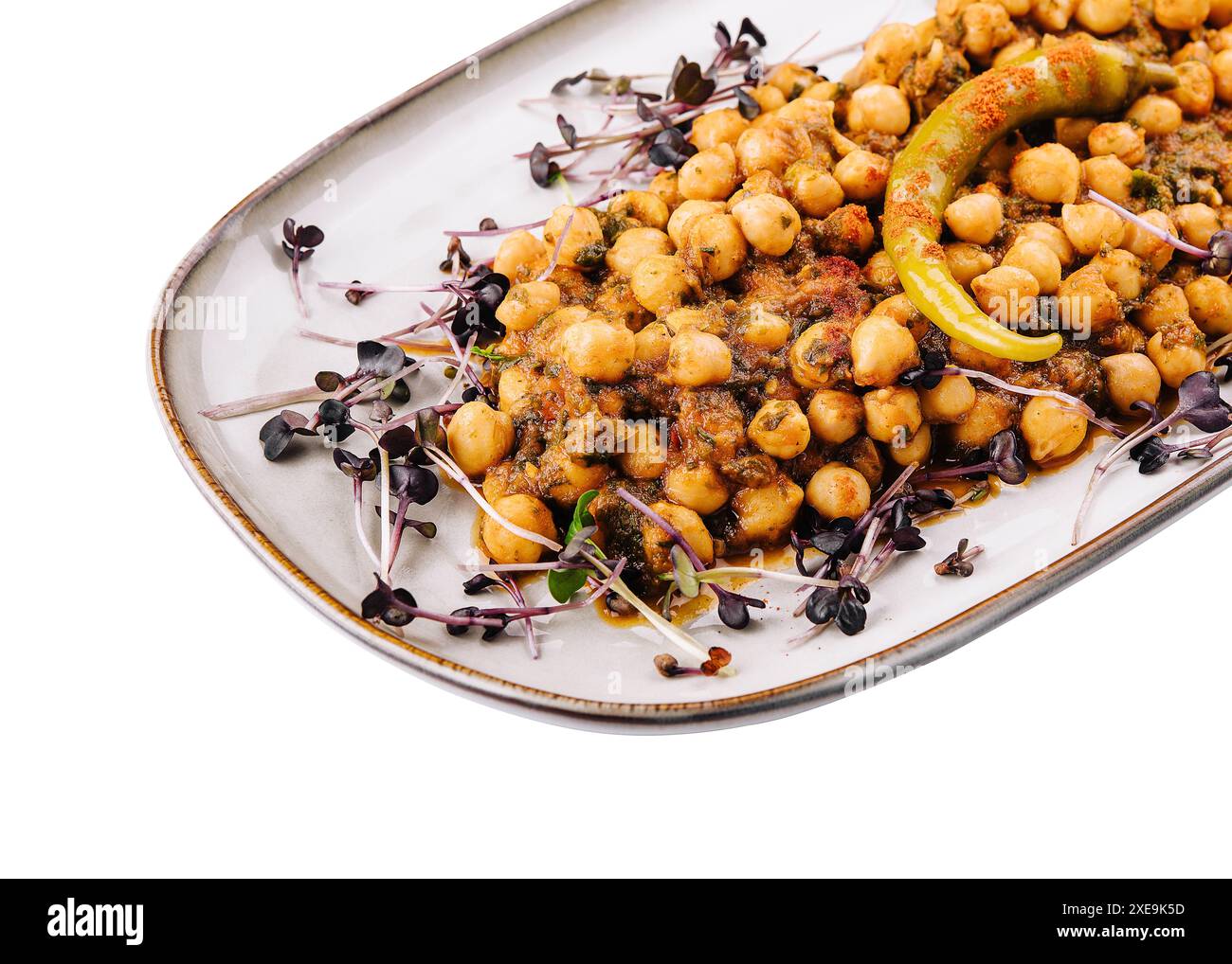 Curry de pois chiches épicé, chana masala ou choley dans une assiette avec chapati Banque D'Images