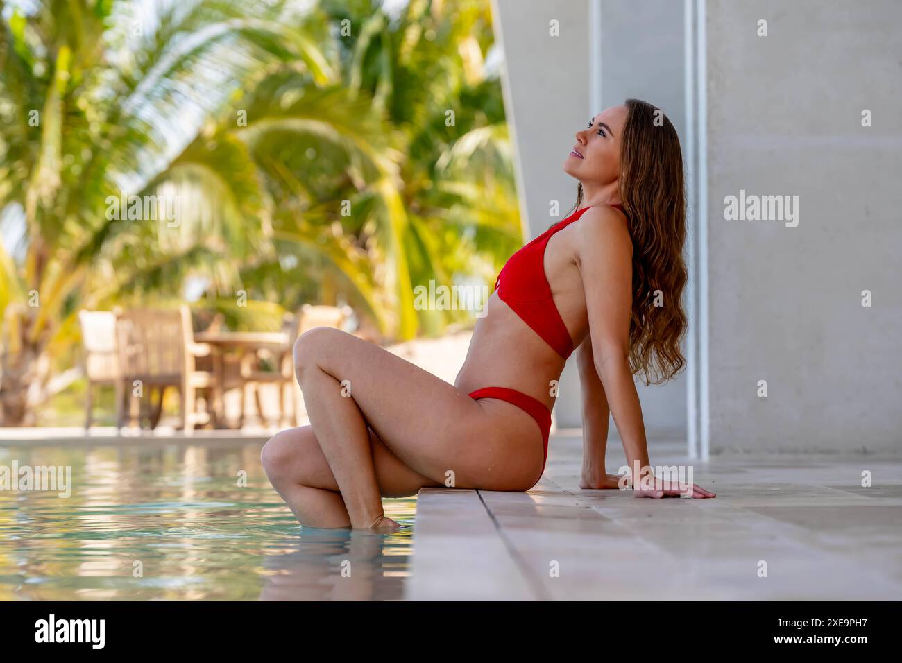 Caribbean Chic : a Radiant Retreat - les petits soins de beauté au paradis de la piscine en vacances de rêve Banque D'Images