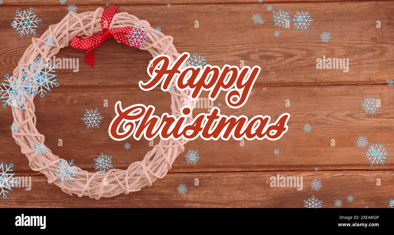 Image de texte de voeux de noël sur la neige tombant et décorations de noël Banque D'Images