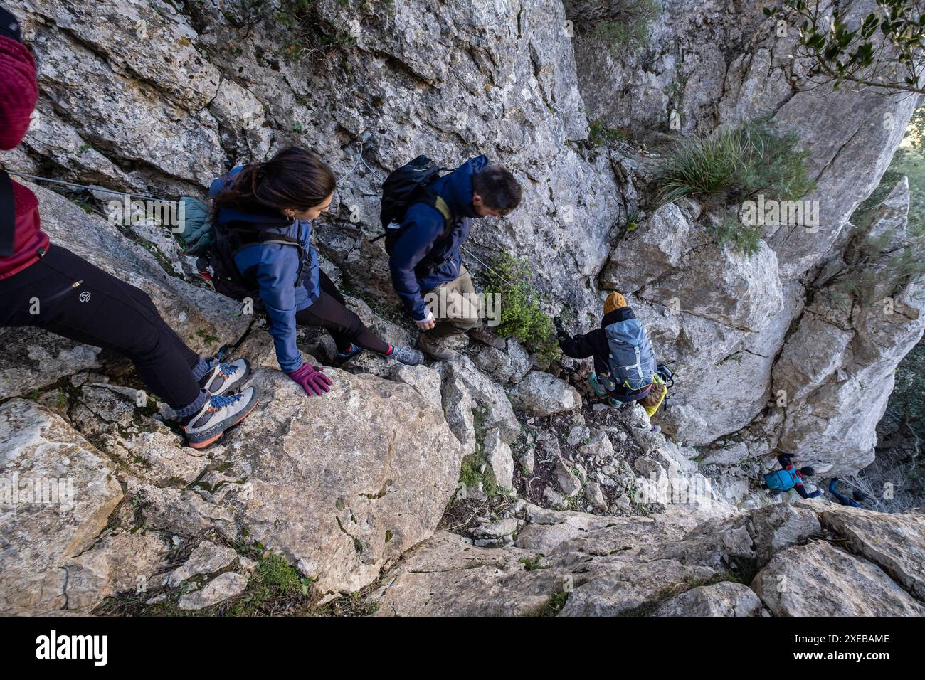 Randonneurs descendant le col de Bisquerra Banque D'Images