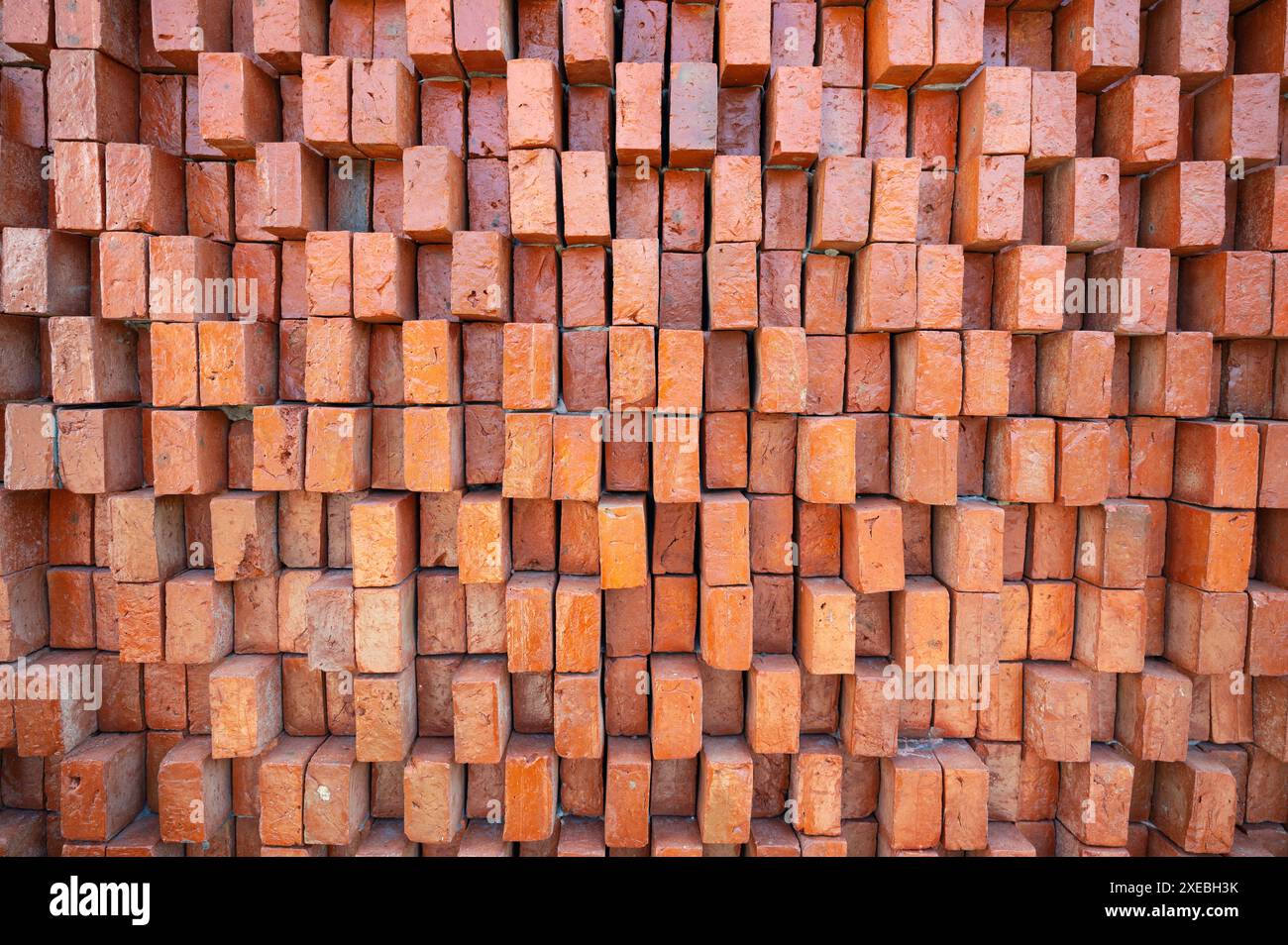 Fond rétro robuste de texture de mur de brique orange Banque D'Images