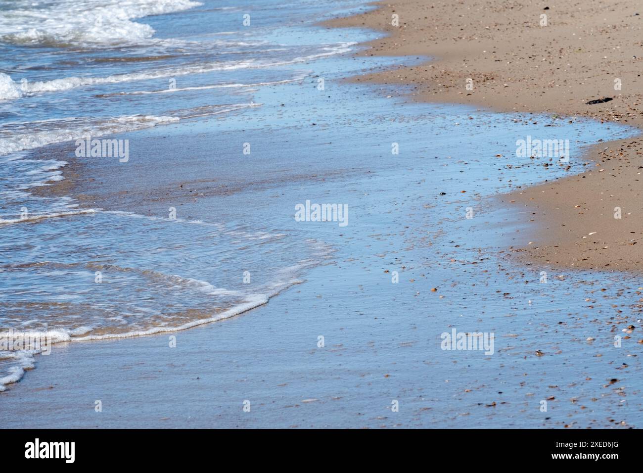 Vagues douces sur un rivage de Shelly Beach Banque D'Images