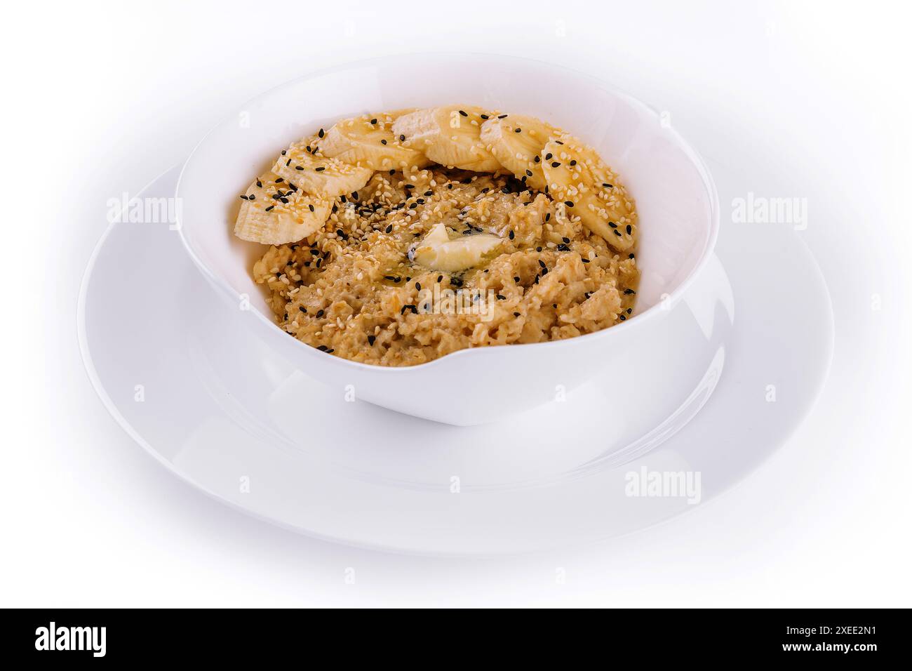 Bol de porridge d'avoine avec banane Banque D'Images