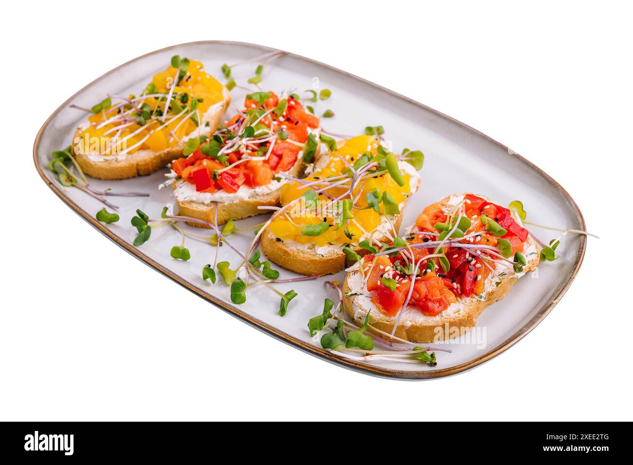 bruschetta avec fromage à la crème et poivron grillé multicolore Banque D'Images