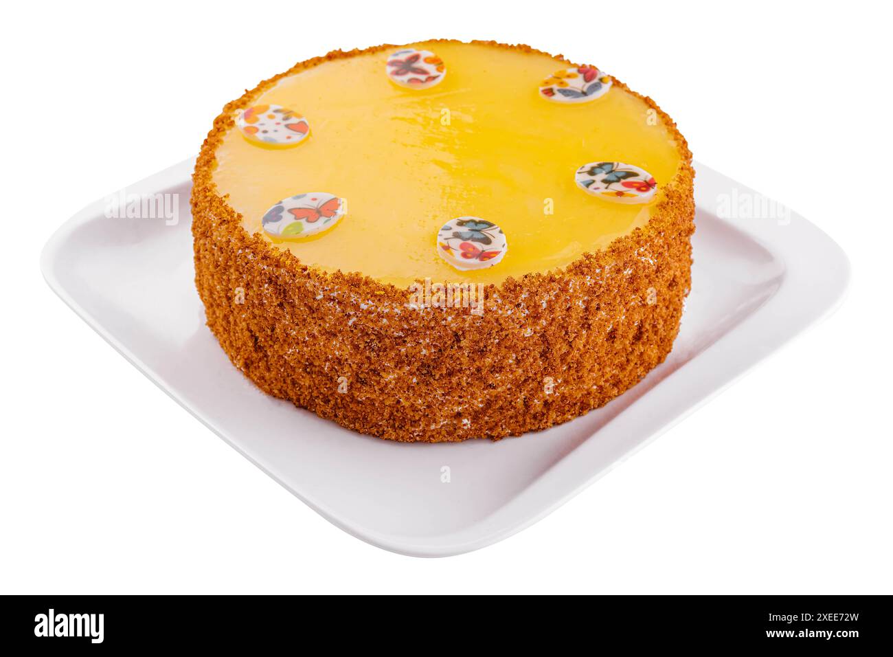 Gâteau aux carottes en glaçage jaune sur assiette Banque D'Images