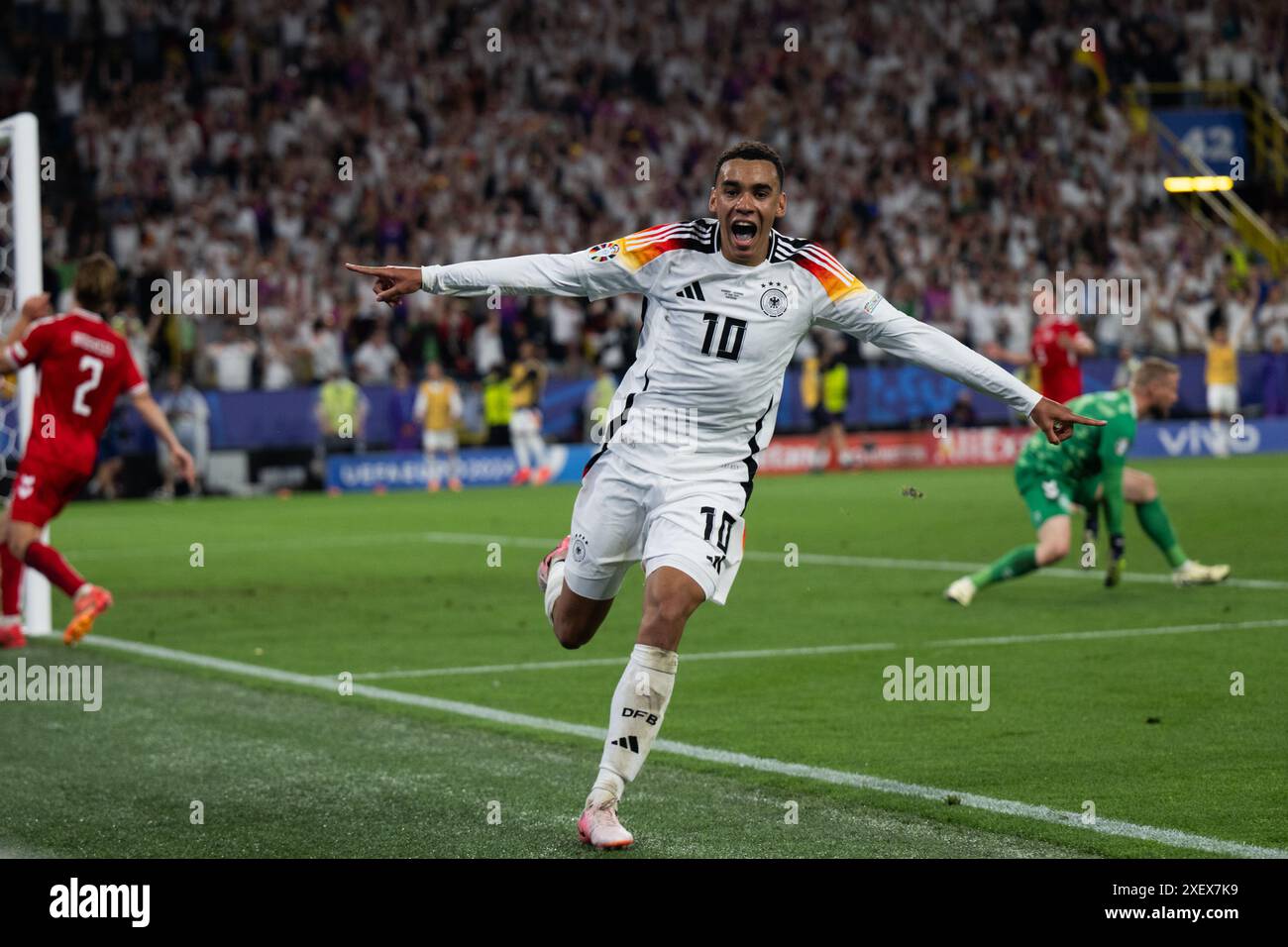 Dortmund, Allemagne. 29 juin 2024. Jamal Musiala, d’Allemagne, célèbre le but lors du match de la ronde 16 de l’UEFA Euro 2024 entre l’Allemagne et le Danemark à Dortmund, Allemagne, le 29 juin 2024. Crédit : Xiao Yijiu/Xinhua/Alamy Live News Banque D'Images