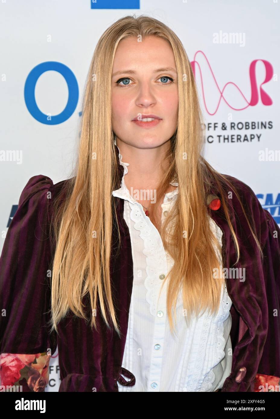 LONDRES, ANGLETERRE : 5 juillet 2024 : Poppy Lee Friar participe aux Nordoff et Robbins O2 Silver clefs Awards 2024, un événement annuel prestigieux organisé par la plus grande association caritative de musicothérapie du Royaume-Uni Nordoff et Robbins au JW Marriott Grosvenor House, Londres, Royaume-Uni. Banque D'Images