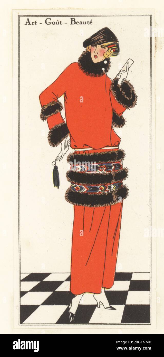 Femme à la mode en robe de luxe par Paul Poiret, 1922. Costume en velours de laine orange mandarine, décoré de bandes de fourrure et de broderies colorées. Lithographie pochoir (pochoir) colorée à la main d'après une illustration de Miss Colette, Miss J. Dory, Burstin, myRIO ou P. Scavone de Art, goutte, Beaute, publié par le magazine de mode AGB, Lyon, Noël 1922. Banque D'Images
