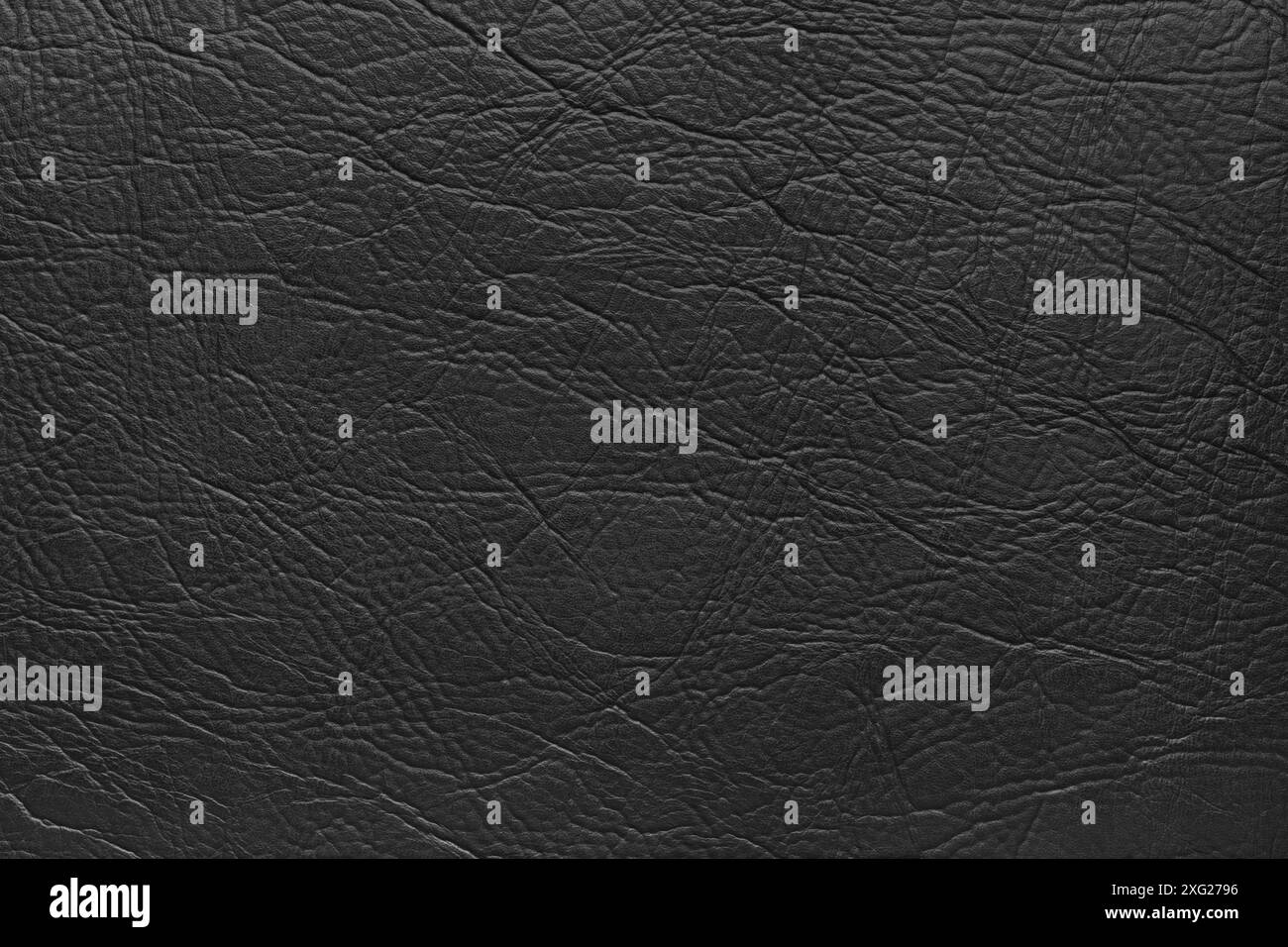 Texture de cuir noir véritable, peau d'animal naturelle, fond de cuir de vache vintage de luxe. Similicuir écologique, structure rugueuse en faux cuir. Wallpap Banque D'Images