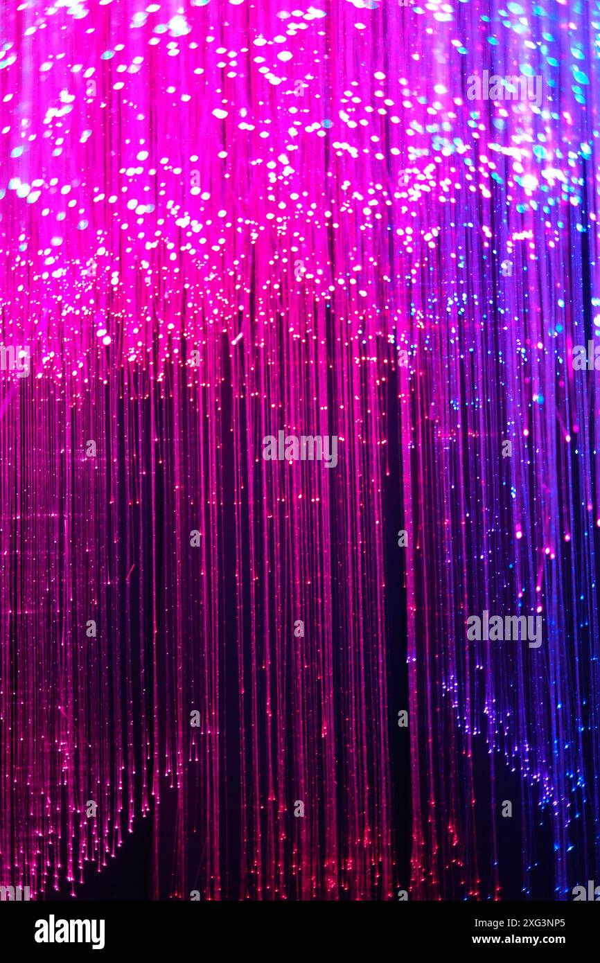 La fibre optique arrière-plan avec beaucoup de taches claires Banque D'Images