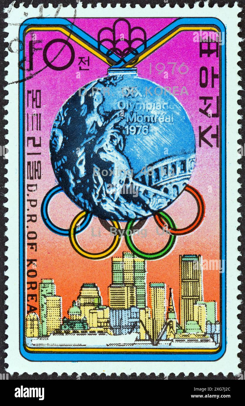 CORÉE DU NORD - VERS 1976 : un timbre imprimé en Corée du Nord à partir de la 1ère émission des "vainqueurs de médailles olympiques" montre une médaille d'argent (boxe, Li Byong-UK) Banque D'Images