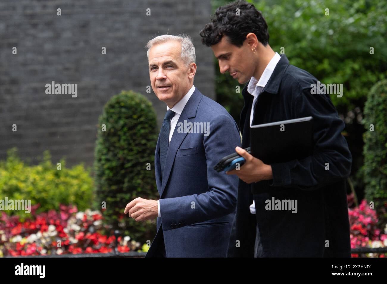 Londres, Royaume-Uni. 09 juillet 2024. Mark Carney - ancien gouverneur de la Banque d'Angleterre (l) et Neil-Amin Smith - conseiller spécial de la chancelière Rachel Reeves (et anciennement du groupe Clean Bandit) arrive pour une réunion à Downing Street. Crédit : Justin Ng/Alamy Live News. Banque D'Images