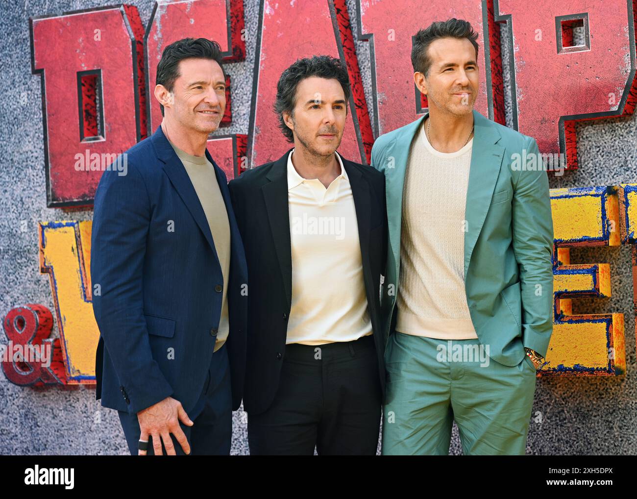 LONDRES, ANGLETERRE - 11 JUILLET 2024 : Hugh Jackman, Shawn Levy, Ryan Reynolds, assistent à l'avant-première britannique de 'Deadpool & Wolverine' à Eventim Apollo, Hammersmith, le 11 juillet 2024 à Londres, Angleterre. ( Credit : Voir Li/Picture Capital/Alamy Live News Banque D'Images