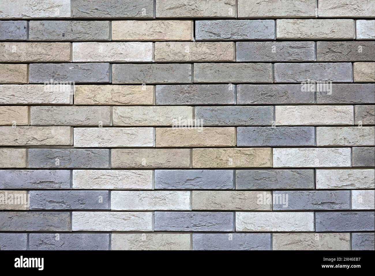 Mur de briques décoratives à pois décoratives beige Motley photo horizontale vue de face en gros plan Banque D'Images