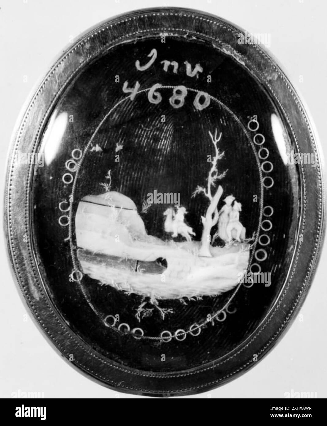 Portrait miniature d'un homme vêtu d'un manteau vert, datant de 1790 à 1800, montrant le sujet de la taille vers le haut, avec l'accent sur les vêtements et les traits du visage. Banque D'Images