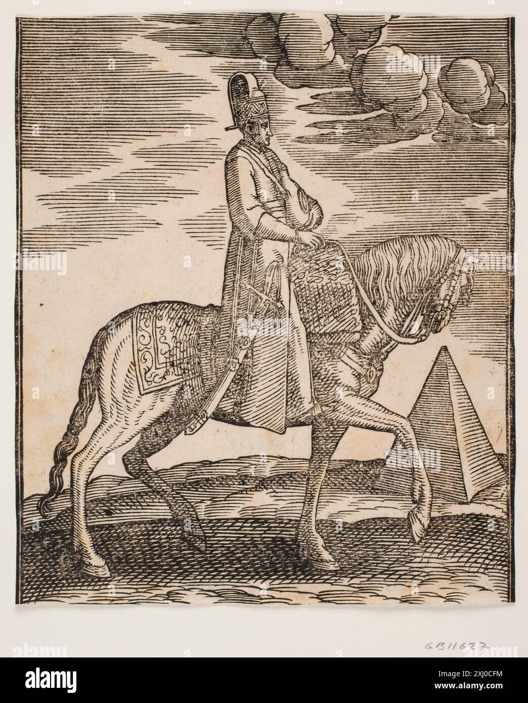 Cavalier avec un flacon autour du cou, profil vers la droite ; une épée à sa droite et un bagage devant lui, drapé sur la selle ; à droite, dans le fond, une pyramide Lorck, Melchior 1526 - 1583 gravure sur bois, Print Melchior Lorck, Erik Fischer, la publication turque no. 81, C 46095, 2009. Gravures, gravures et gravures allemandes de Hollstein 1400-1700 (vol. XXII), Johann Leipolt à Melchior Lorch, Robert Zijlma, vol. XXII, NR. 59, 46482, 1978 Rider avec un flacon autour de son cou, profil vers la droite, une épée à son côté droit et des bagages devant lui, drapés à travers les s. Banque D'Images