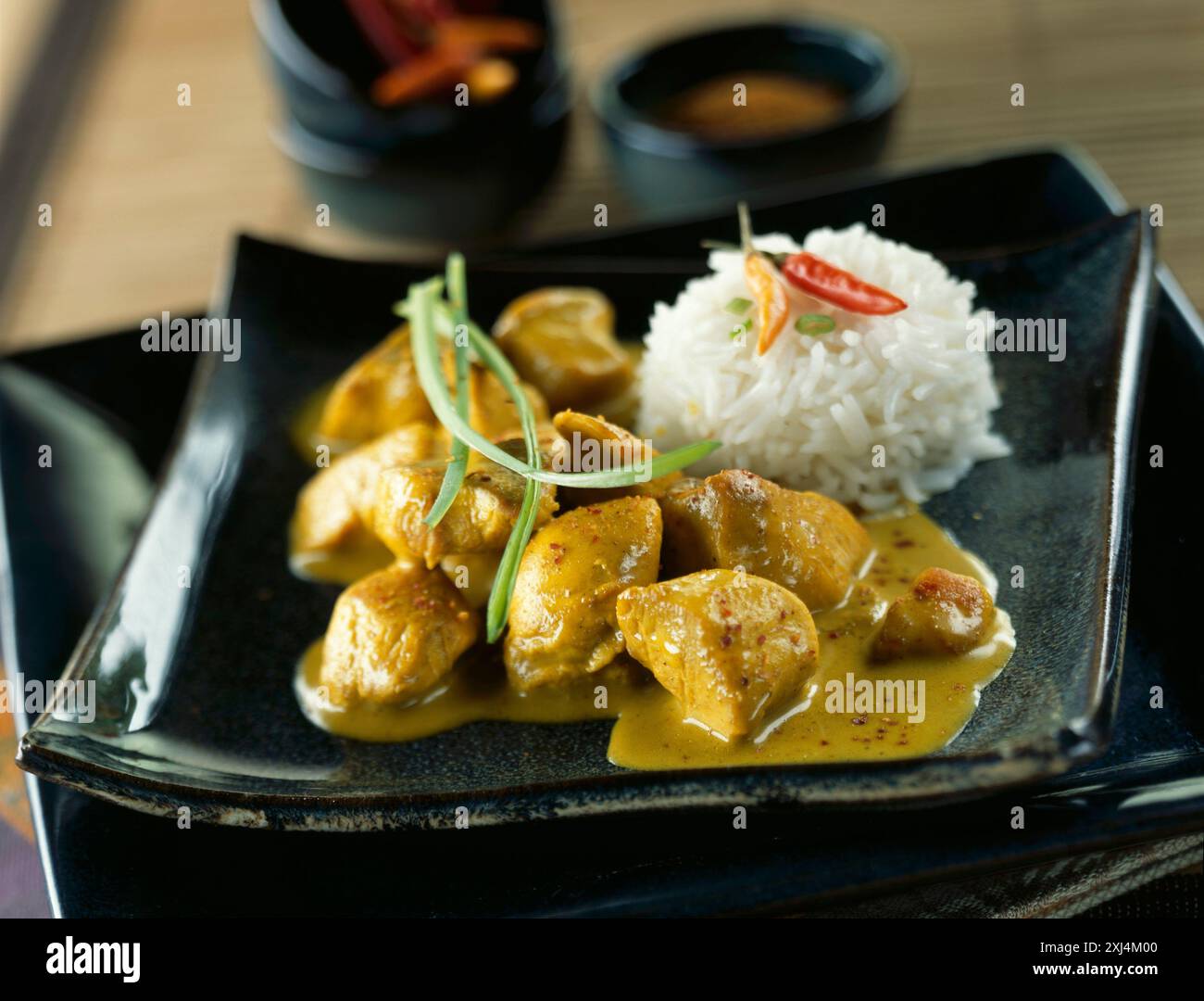 Curry de poulet avec riz blanc Banque D'Images