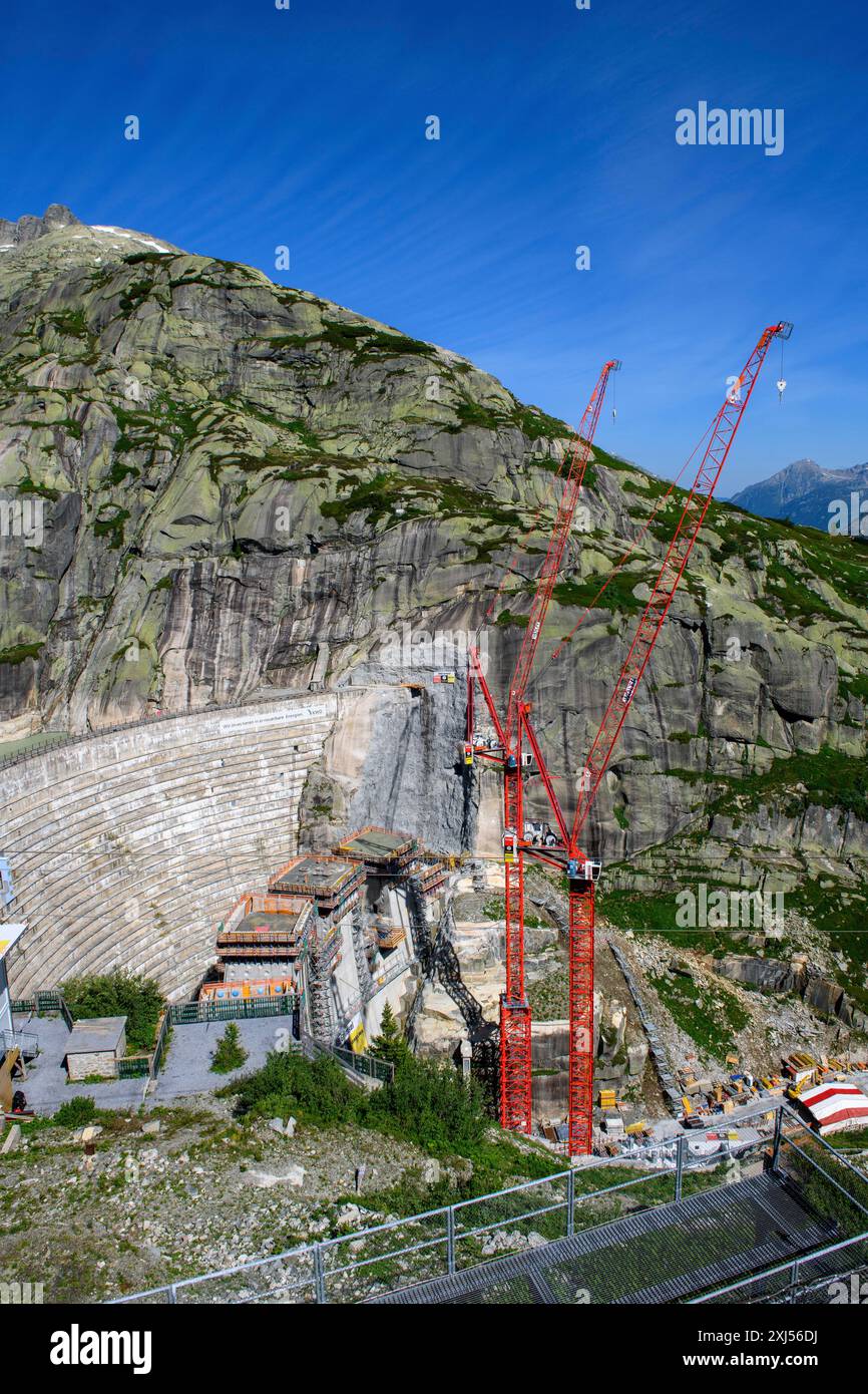 Vue du chantier du nouveau barrage pour l'agrandissement du réservoir Grimselsee barrage de remplacement Spitallamm sur le Grimsel dans l'Oberland bernois, à gauche Banque D'Images