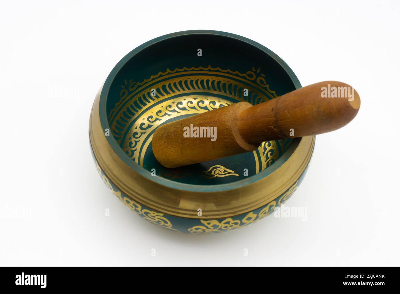 Bol de chant tibétain sur fond blanc Banque D'Images