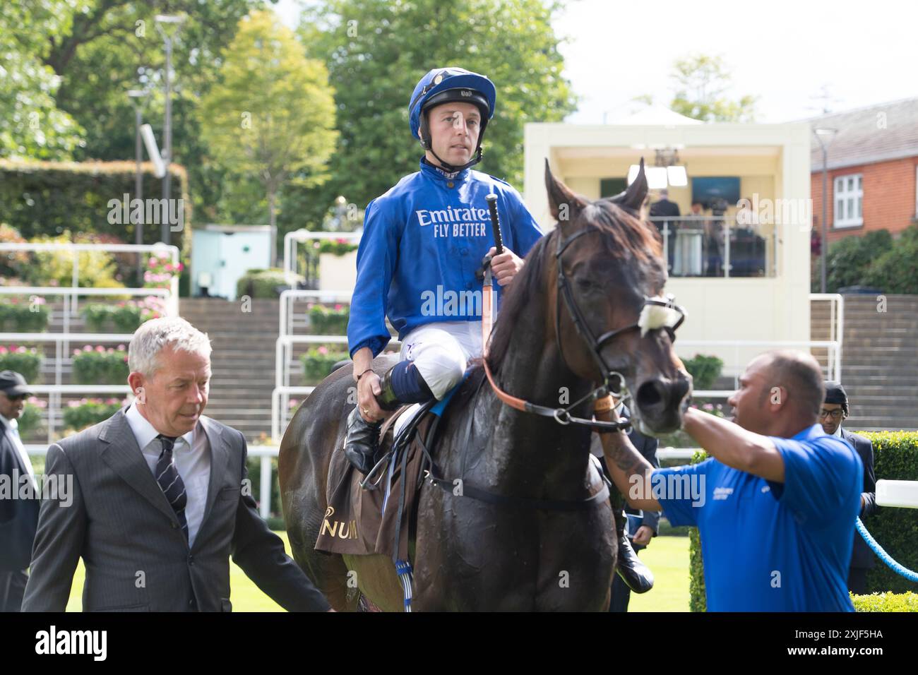 Ascot, Berkshire, Royaume-Uni. 13 juillet 2024. Horse passion and Glory (no 2) monté par le jockey Ray Dawson remporte le Magnum Classic Ice Cream handicap Stakes à Ascot Racecourse dans le Berkshire à la course familiale Summer Mile. Propriétaire et éleveur Godolphin, entraîneur Saeed bin Suroor, Newmarket, sponsor Emirates Fly Better. Crédit : Maureen McLean/Alamy Banque D'Images