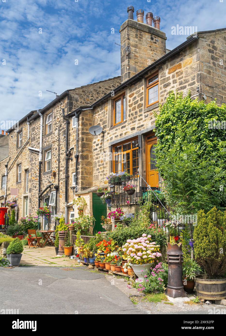 Maisons typiques dans le Yorkshire ouest village d'Addingham Banque D'Images