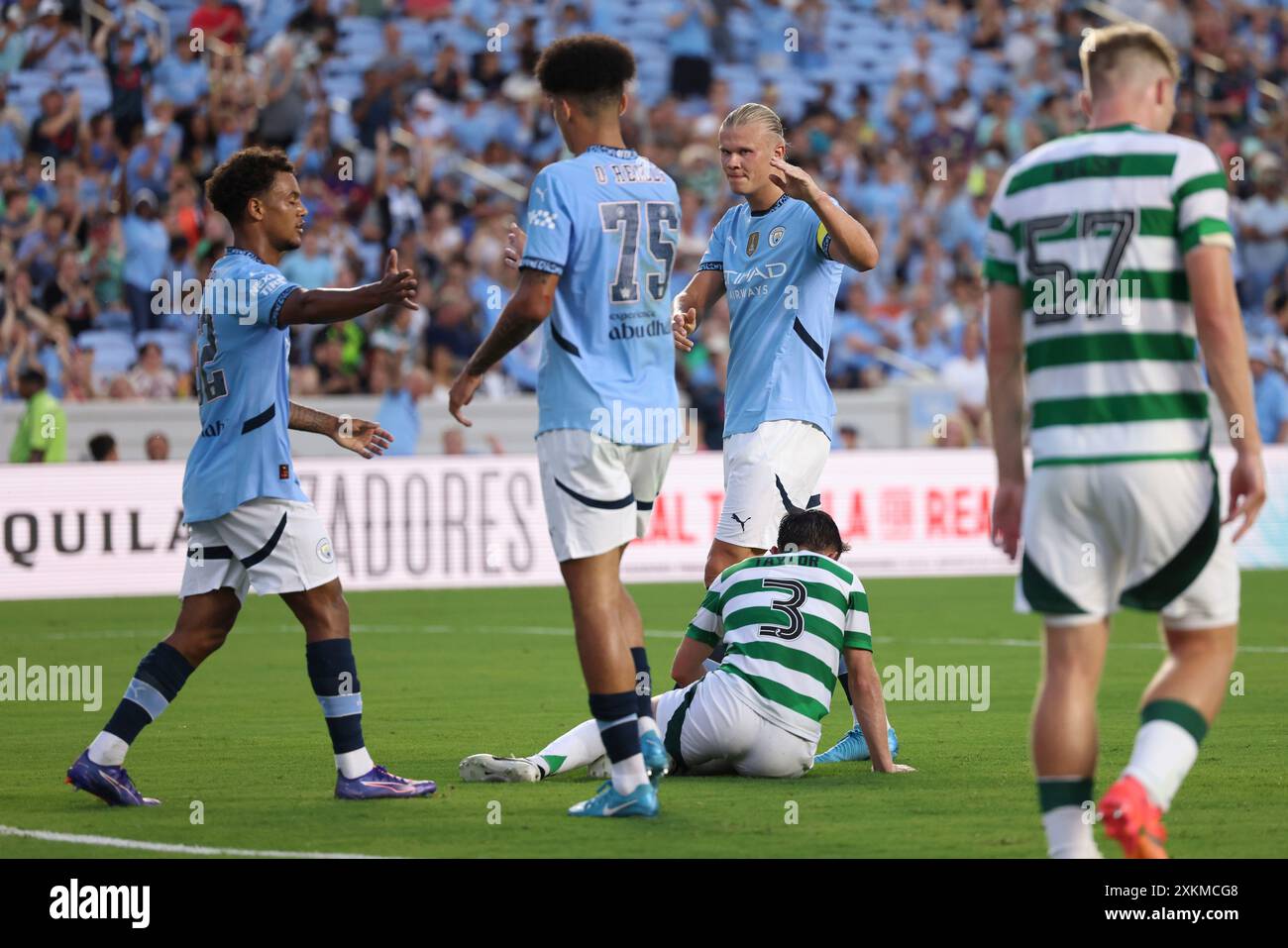 July 23, 2024: Manchester City midfielder Oscar Bobb (52) celebrates a goal with midfielder Nico O'Reilly (75) and forward Erling Haaland (9) during the FC Series match between Manchester City and Celtic at Kenan Memorial Stadium in Chapel Hill, North Carolina. Greg Atkins/CSM (Credit Image: © Greg Atkins/Cal Sport Media) (Cal Sport Media via AP Images) Banque D'Images