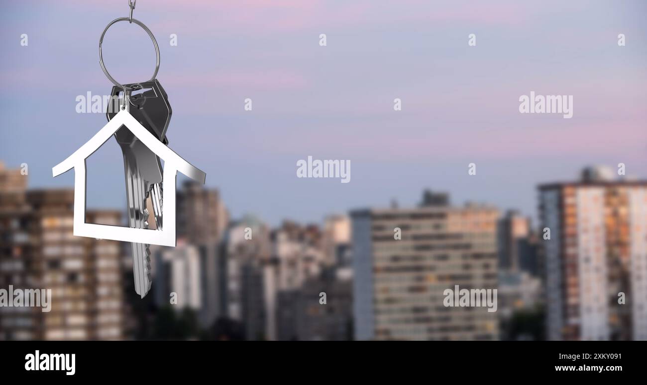 Image d'une clé de maison argentée au-dessus du paysage urbain Banque D'Images