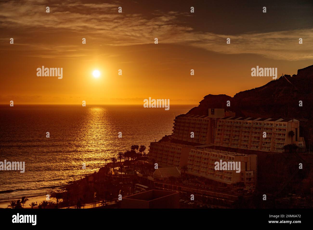 Coucher de soleil sur l'océan atlantique depuis Taurito, Gran Canaria dans les îles Canaries Banque D'Images