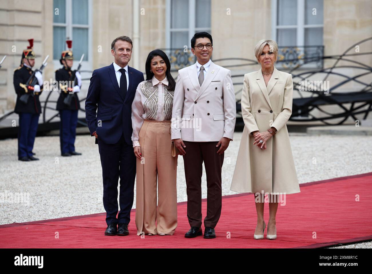 Le président français Emmanuel Macron, Mialy Rajoelina, le président malgache Andry Nirina Rajoelina et Brigitte Macron assistent à la réception organisée au Palais de l'Élysée avant la cérémonie d'ouverture des Jeux Olympiques de Paris 2024, à Paris, France, le 26 2024 juillet. Photo Raphael Lafargue/ABACAPRESS. COM Banque D'Images