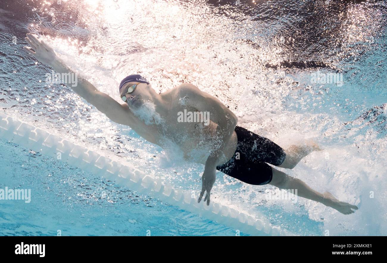Paris, France. 28 juillet 2024. Léon Marchand, de France, participe à la finale du médaillé individuel du 400 m masculin de natation aux Jeux Olympiques de Paris 2024 à Paris, France, le 28 juillet 2024. Crédit : Xia Yifang/Xinhua/Alamy Live News Banque D'Images
